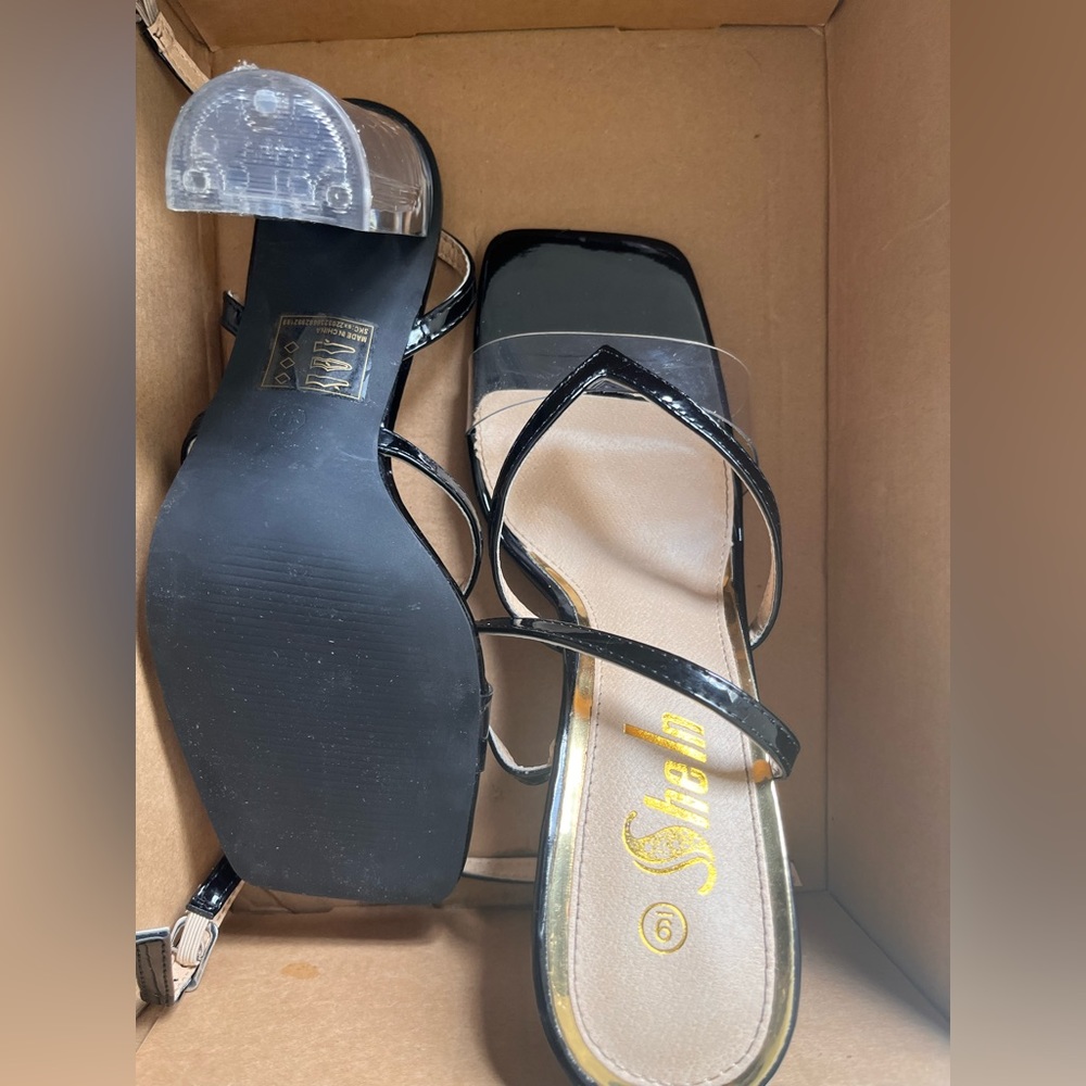 Black heels with clear bottoms